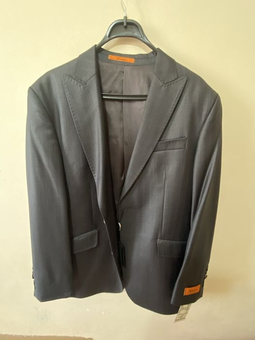 Новый  мужской  костюм   продам .