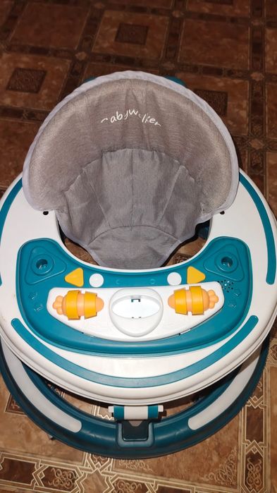 Продам детский ходунок - качалка 2в1