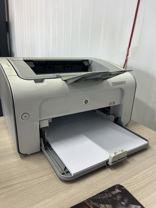 Принтер HP P1102