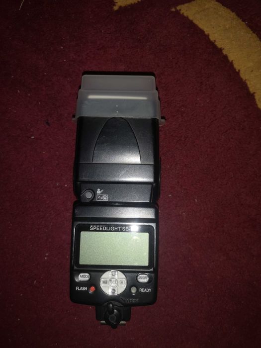 Bliț Nikon și Olympus