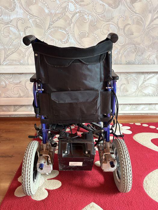 Электрическая инвалидная коляска