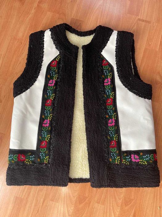 O să vând o vestă. cu ridicata si cu amanuntul