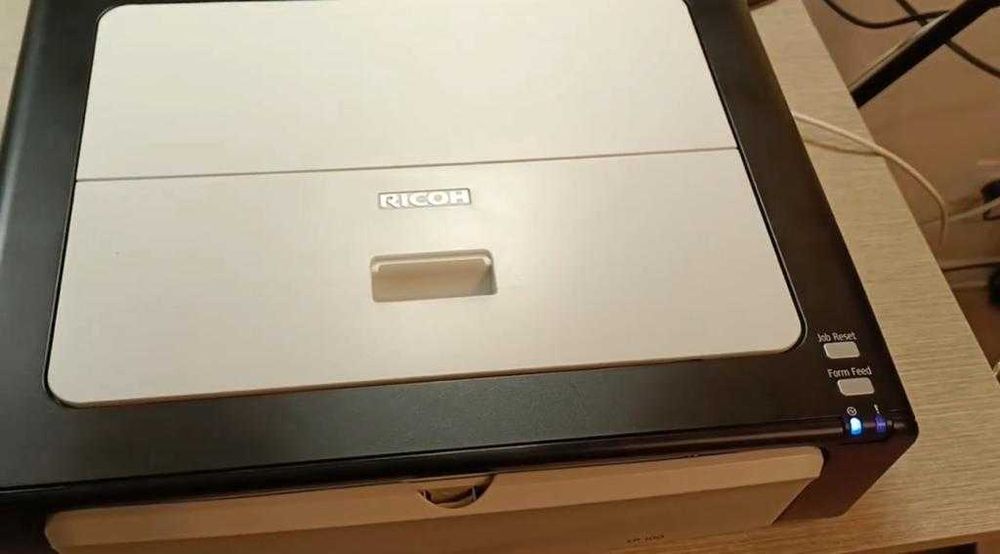 Принтер Ricoh Aficio SP 100