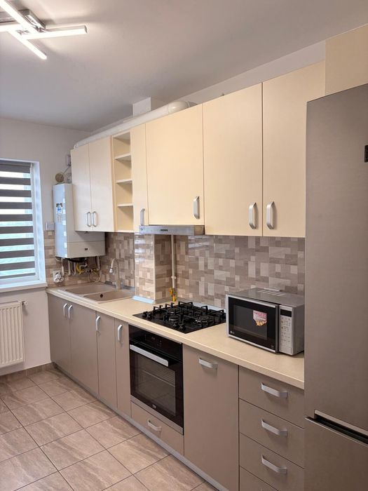 Apartament complet mobilat cu 2 camere și loc de parcare cu CF,