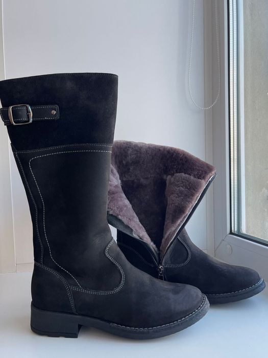 Продам зимние сапоги новые