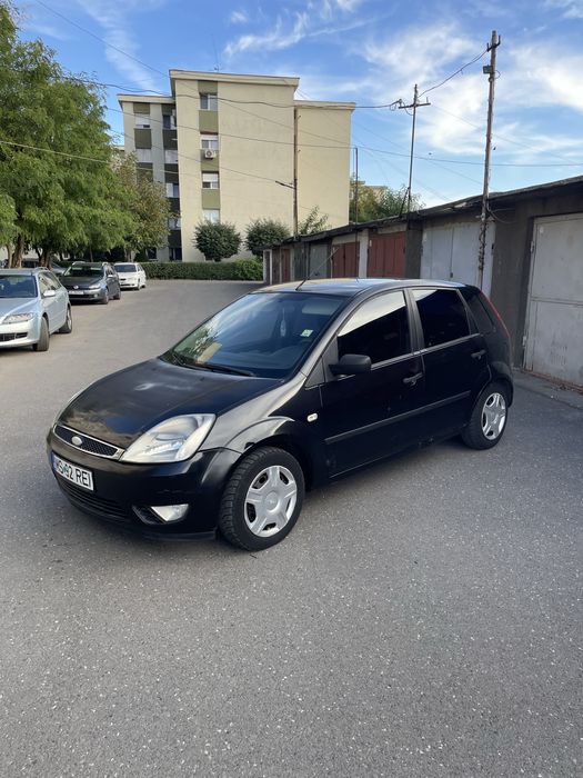 Ford Fiesta 2004  PRET 3299 Lei