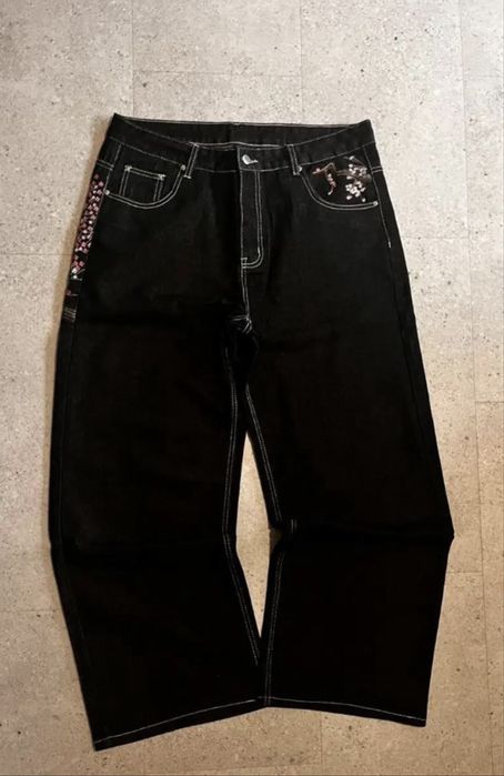 Джинсы с сакурой