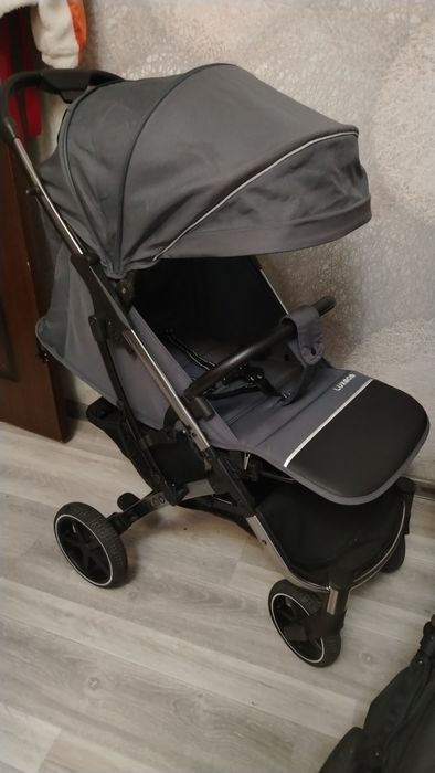 Продам детскую коляску чемодан Luxmom