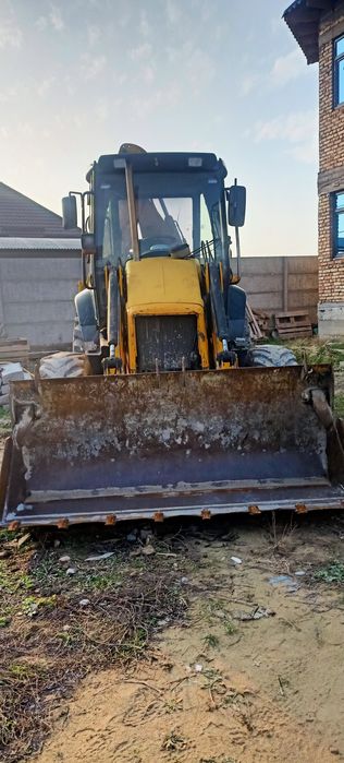 Экскаватор погрузчик 3в1