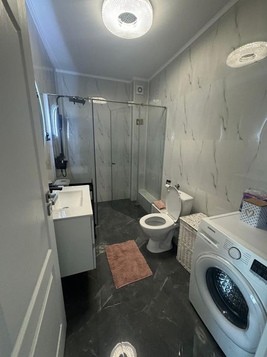 Închiriez apartament cu 2 camere cu loc parcare bloc nou str. Gh.  Doja