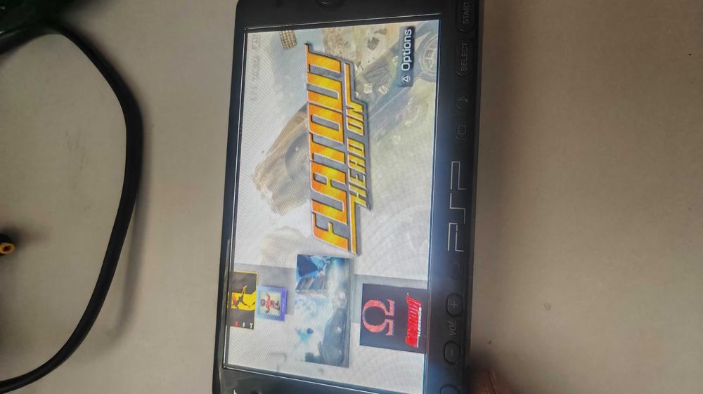 Playstation PSP modat, cu 116 jocuri -vandut