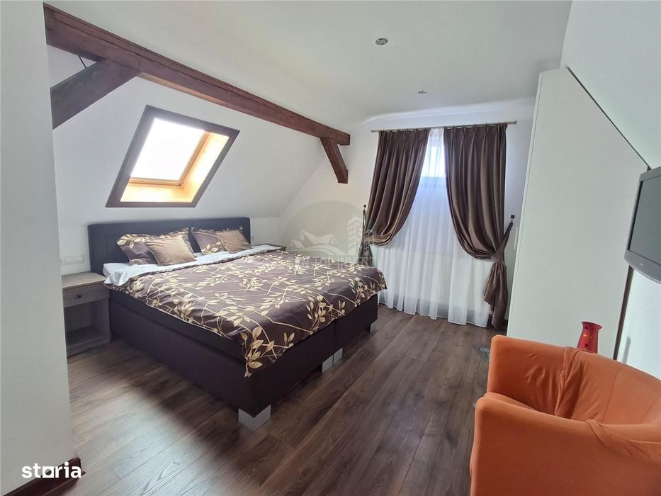 Casa individuala 4 camere 4 bai 250mp curte zona Piata Cluj