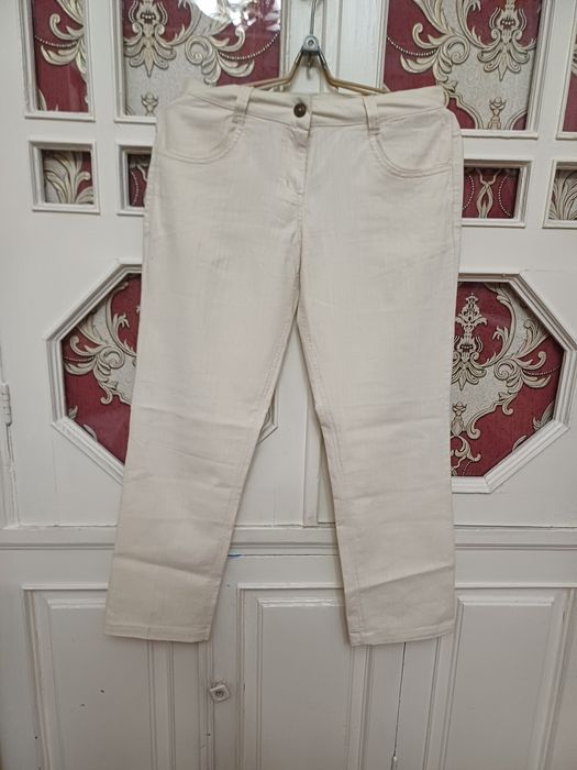 Продается  бежевый брюк
