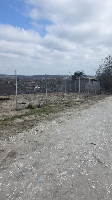 Изграждане на огради(ограда)с мрежа, бетонни,поцин. колове,почистване