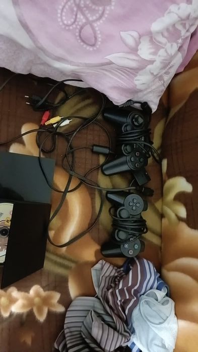 Vând PS2 sau schimb cu telefone stricare