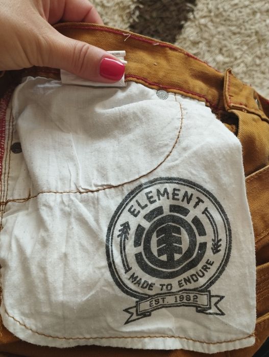 Pantaloni pană de culoare maro