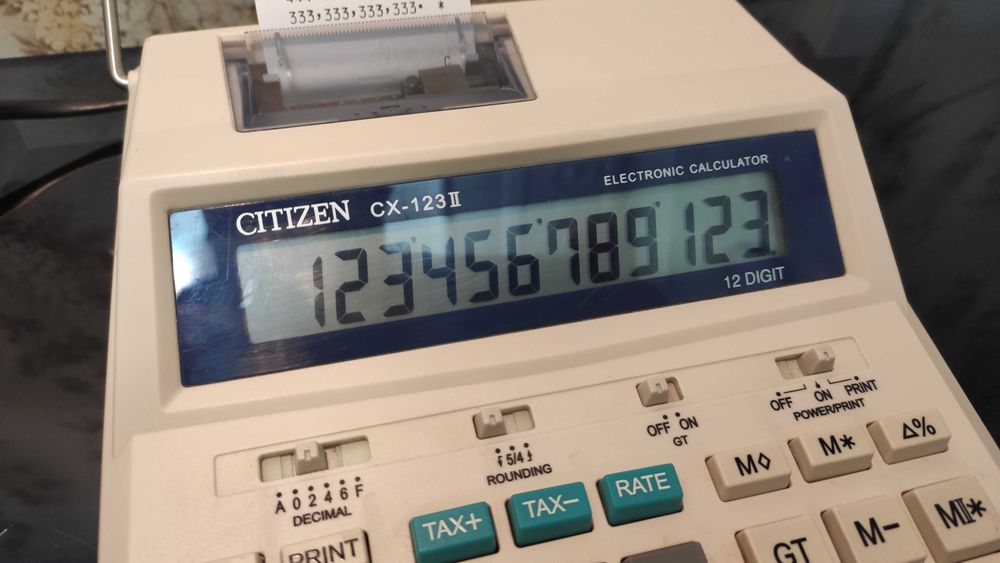 Citizen CX-123 II  печатающий калькулятор.