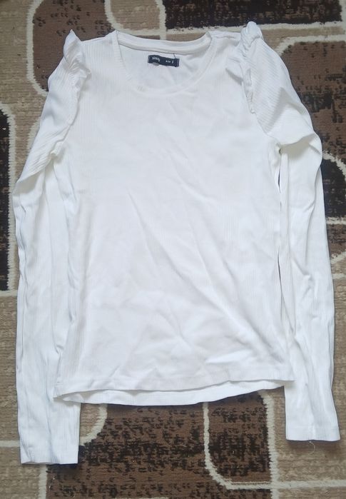 Отдам  одежду ( пакет)