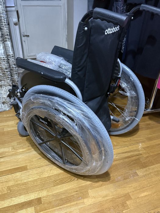 Инвалидная коляска