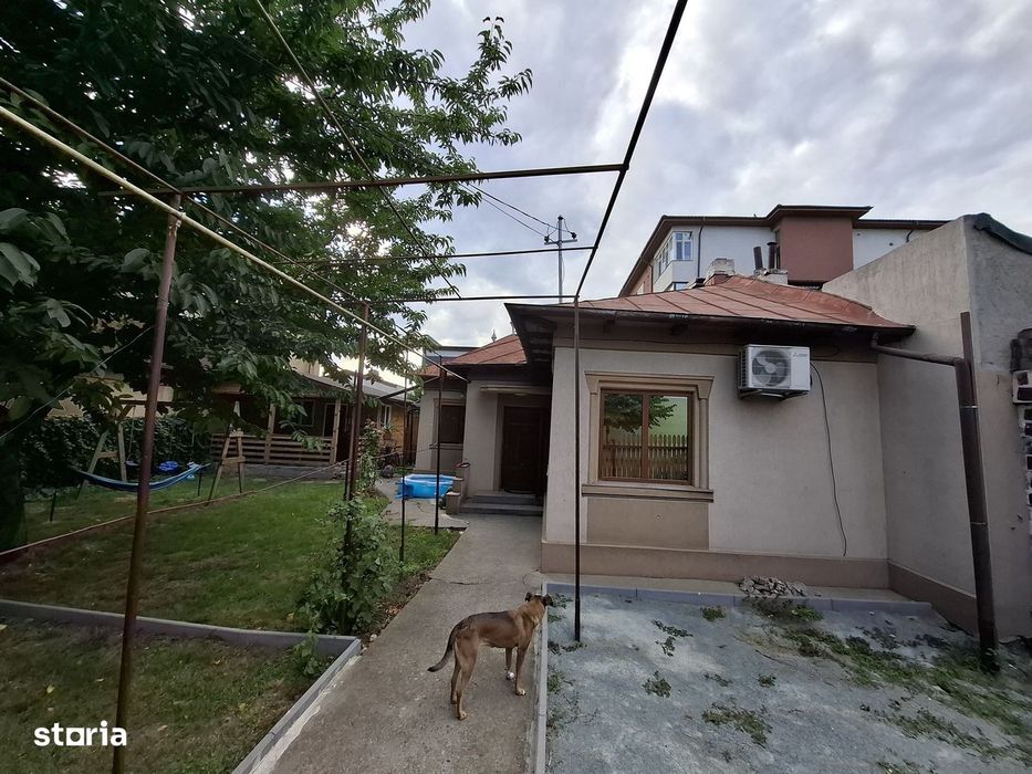 Casă 3 camere curte amenajată cu foișor Km4