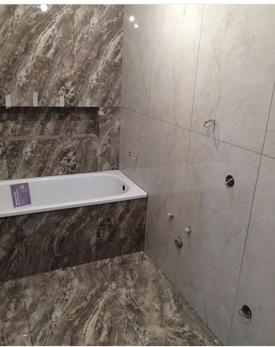 Укладка кафеля ,услуга кафельщика.