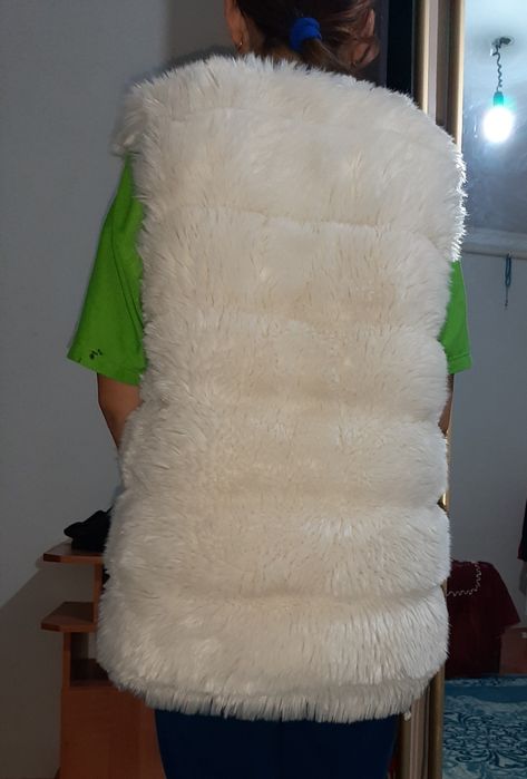 Меховая жилетка..