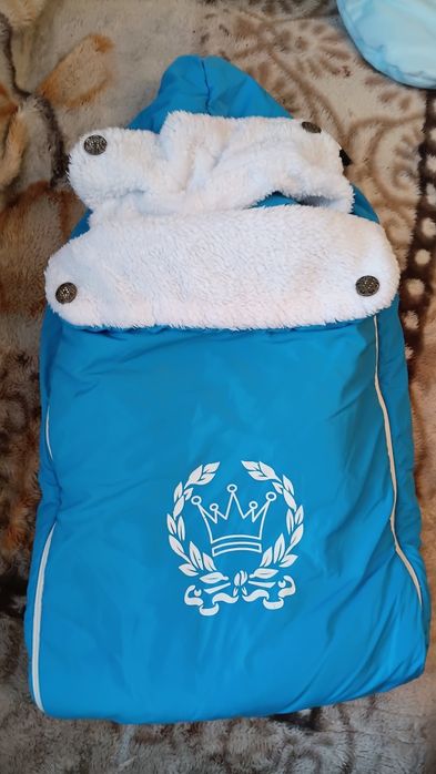 Отдам зимний конверт за вкусняшки  либо обмен