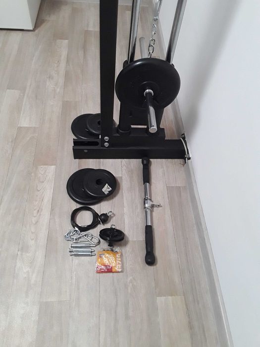 Aparat fitness de perete pentru tractiuni cu discuri .500 de lei