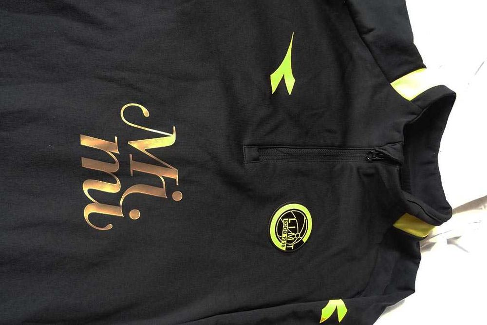 продавам спортна блуза диадора в черно с жълто за ръст 164см