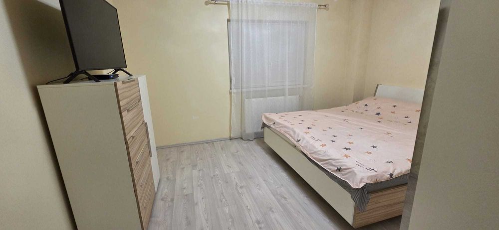 Apartament cu 2 camere cu curte– Confortul de la bloc îmbinat cu beneficiile unei case!