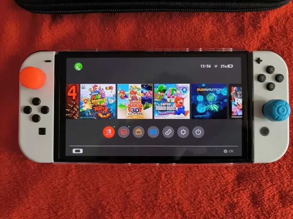 CA NOU! Nintendo Switch OLED + FC 24 CADOU