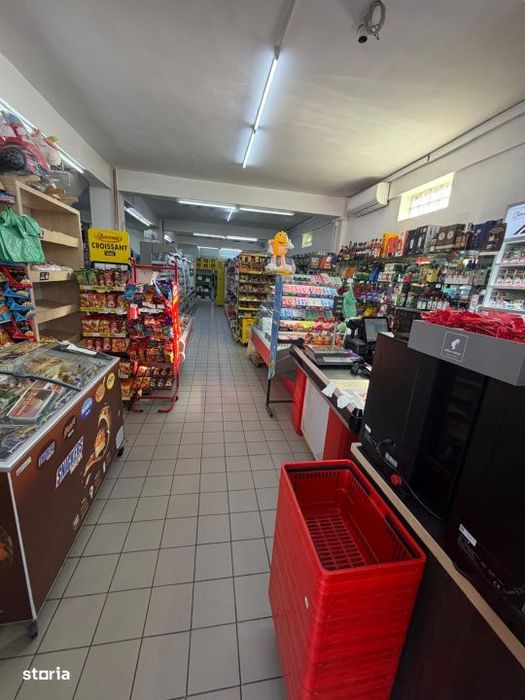 Spatiu comercial , 1300 mp pe 4 nivele, in centrul orasului Filiasi