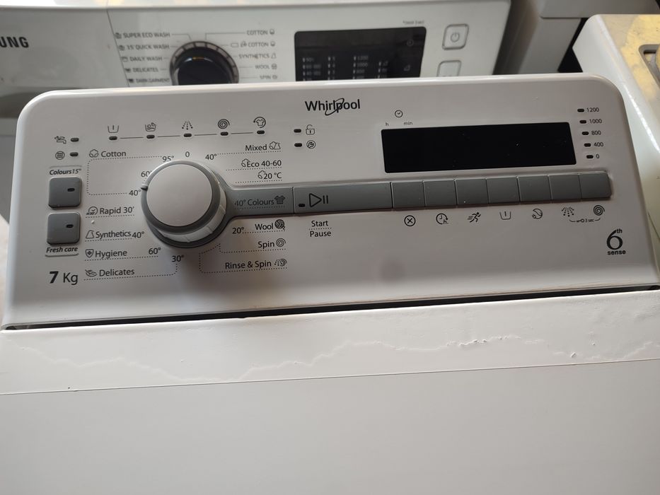 Vând masina de spălat verticala 390 Ron