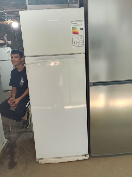 Premier xolodilniklar yangi karopka dakument uch yil garantya