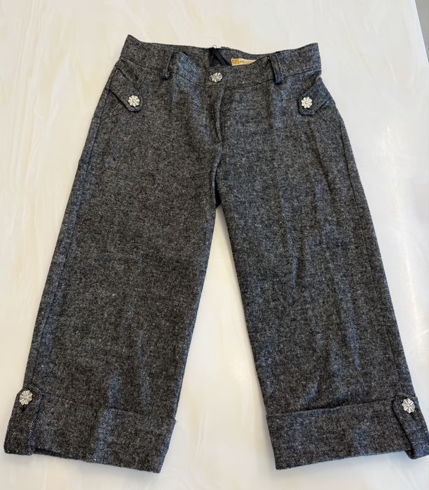 Pantaloni trei sferturi