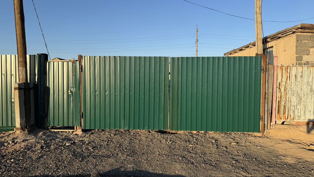 Продам землю с постройкой