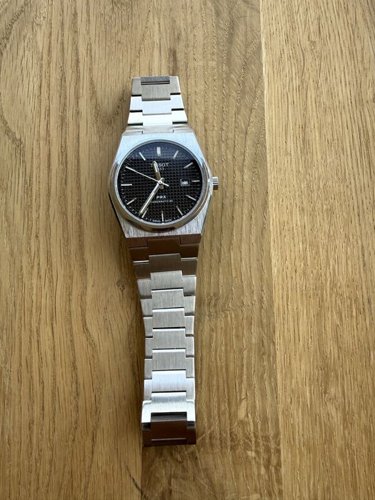 Продавам Tissot PRX Powermatic 80 в отлично състояние.