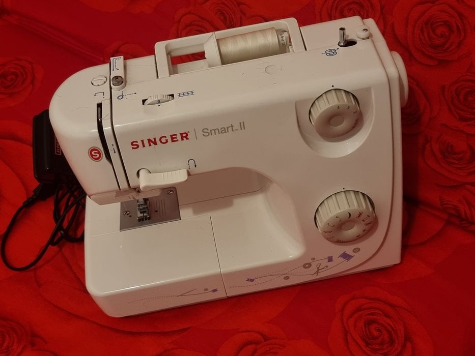 Se vinde masina de cusut Singer Smart II