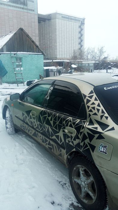 Продам машину Мазда 323 рестайлинг