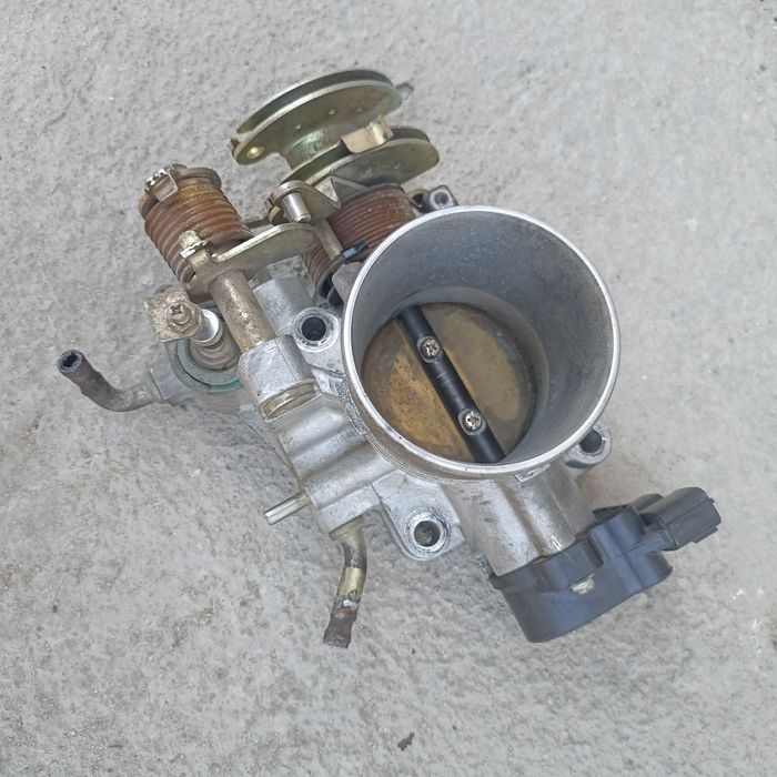 Дроссельный заслонка