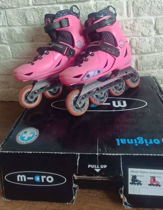 Роликовые коньки