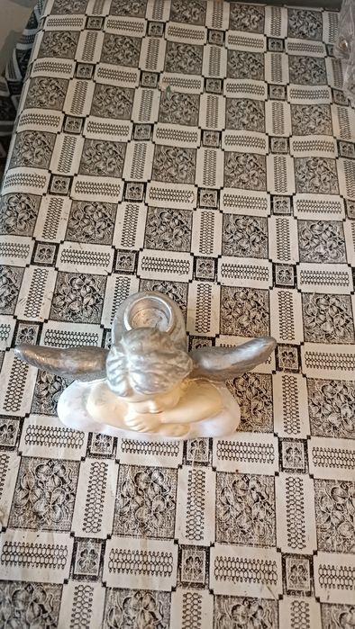 Статуэтка -подсвечник