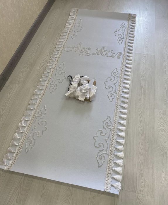 Ақ жол тусаукесер, тұсау кесер