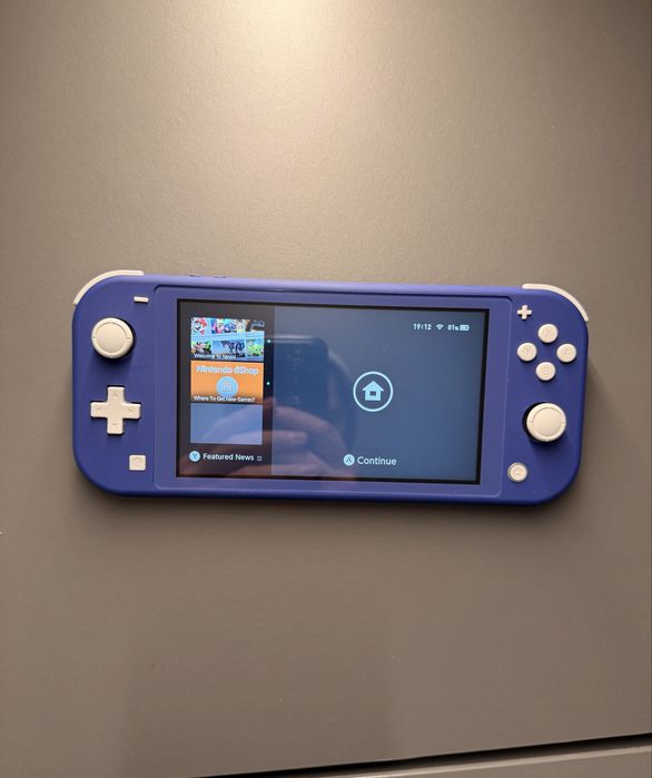 Nintendo Switch Lite ca nou + Joc Minecraft