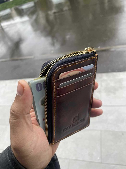 Portofele din piele naturala lucrate integral manual in Romania