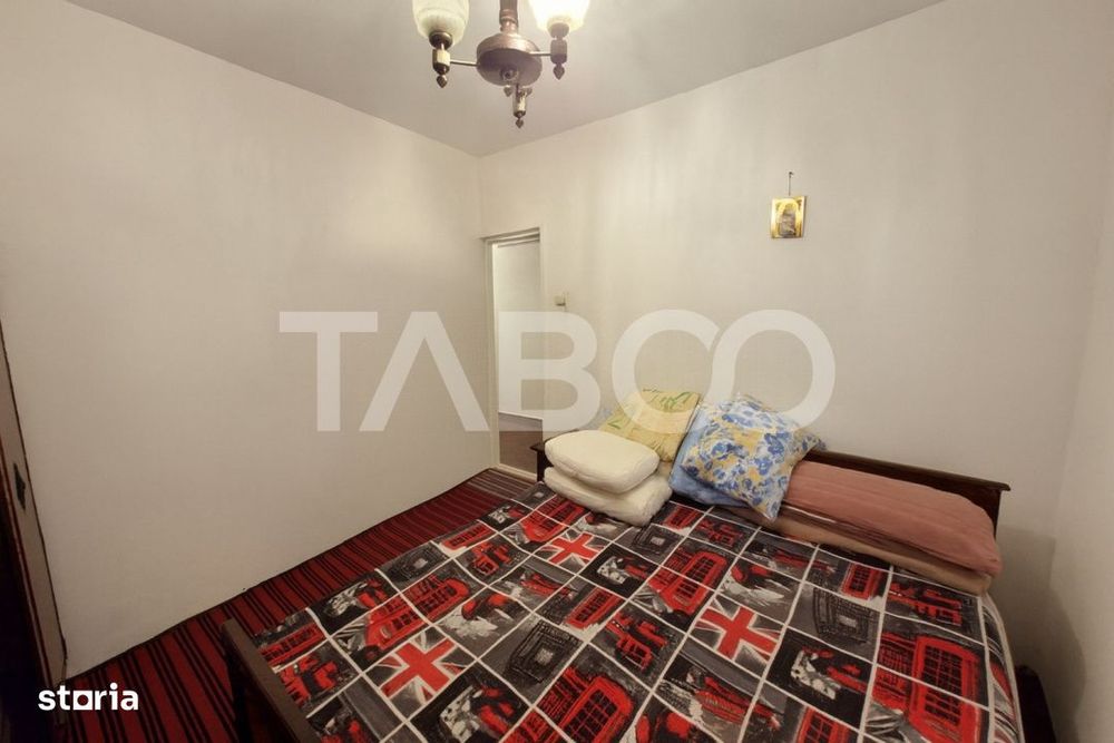 Apartament etaj 1 de vanzare 3 camere 2 bai balcon pivnita Cisnadie