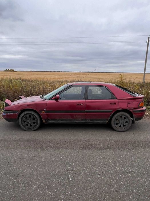 Автомобиль Mazda 323f bg