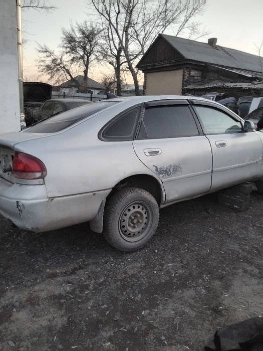 Продам мазду кронос по запчастчм