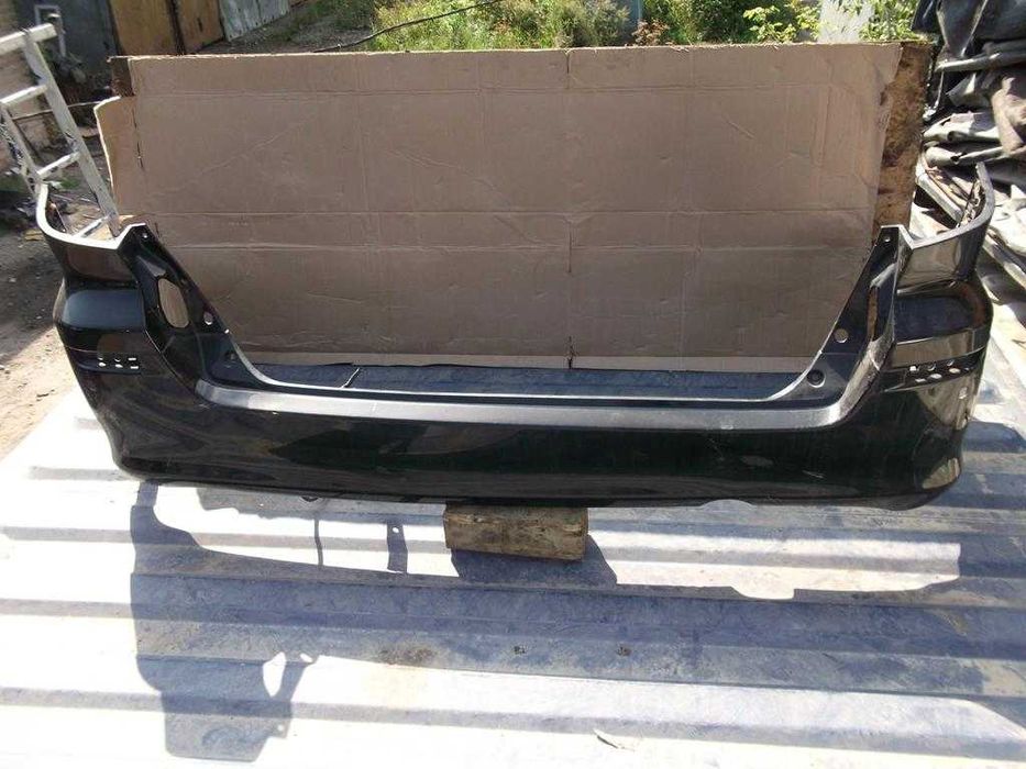 Бампер задний Toyota Alphard I