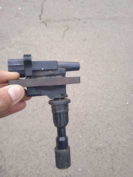 Катушка Мазда 323